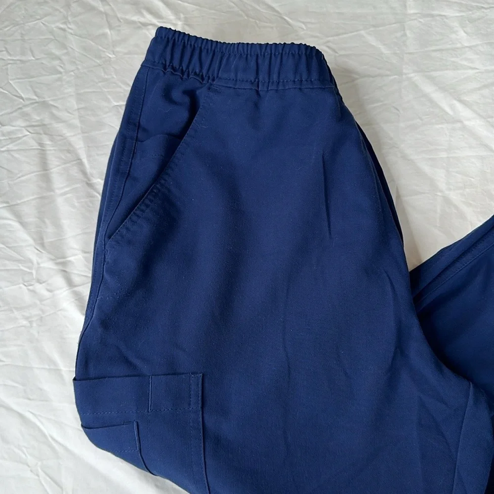 Movement Mens Navy Blue Scrubs Tapered Joggers with multiple pockets. Inseam 28”